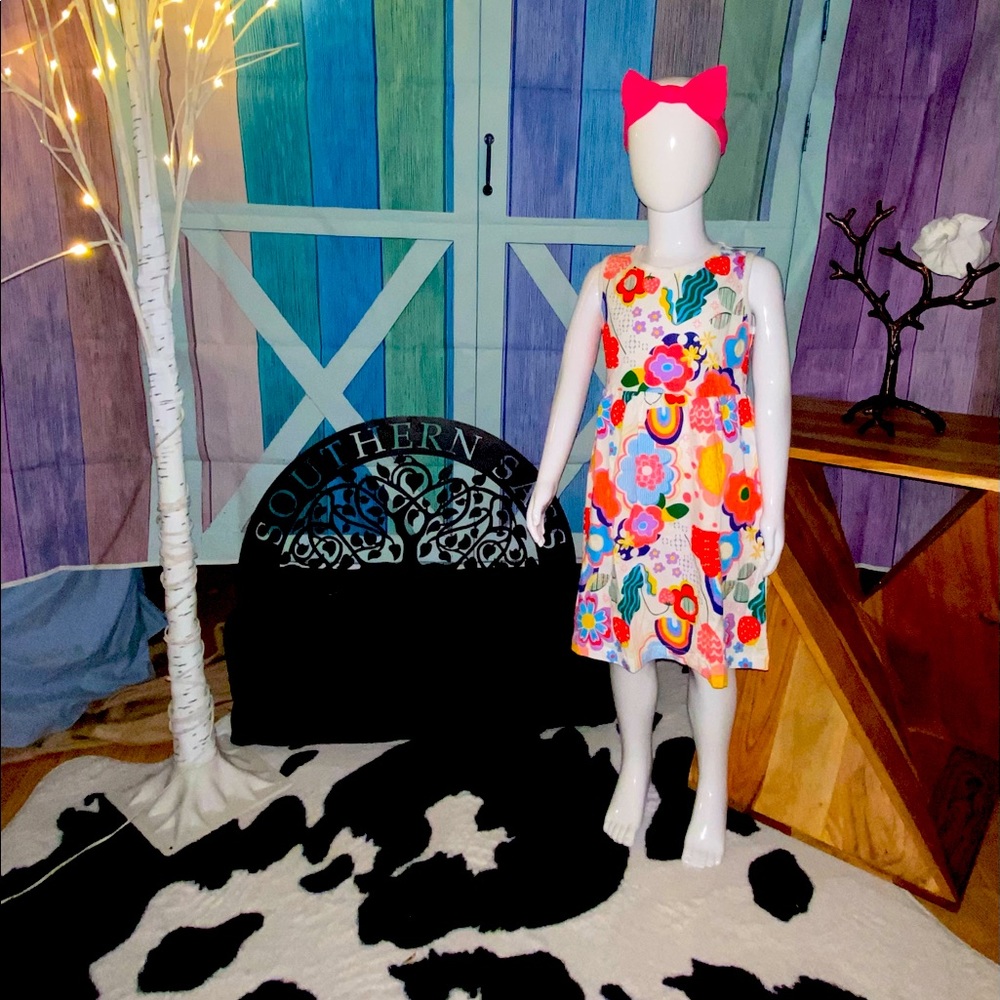 Child’s flower and rainbow print summer dress